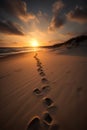 Beautiful sunset over the Baltic Sea with footprints on the sand. Royalty Free Stock Photo