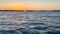 Beautiful sunset over calm ocean water Royalty Free Stock Photo
