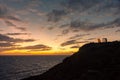 Beautiful sunset over the cliff of The Temple of Poseidon at Cape Sounion, over the Aegean Sea Greece Royalty Free Stock Photo