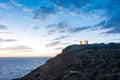 Beautiful sunset over the cliff of The Temple of Poseidon at Cape Sounion, over the Aegean Sea Greece Royalty Free Stock Photo