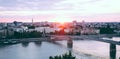 Beautiful sunset over Danube river and Novi Sad City with rainbow bridge Royalty Free Stock Photo