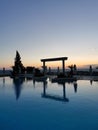 Beautiful sunset over the empty pool and the sea. The Aegean sea. Turkey, Kusadasi. Royalty Free Stock Photo