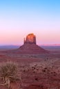 Beautiful sunset over famous Butte of Monument Valley on the border between Arizona and Utah Royalty Free Stock Photo