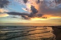 A beautiful sunset over the Gulf of Mexico is viewed from the beach at Treasure Island, Florida Royalty Free Stock Photo