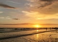 A beautiful sunset over the Gulf of Mexico is viewed from the beach at Treasure Island, Florida Royalty Free Stock Photo