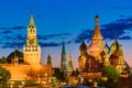 Beautiful sunset over the Kremlin wall towers and St. Basil Cathedral at the Red Square. Summer sunset in Moscow, Russia Royalty Free Stock Photo