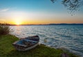 Beautiful sunset over Lake Balaton with a boat Royalty Free Stock Photo