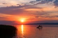 Beautiful sunset over Lake Balaton with silhouettes Royalty Free Stock Photo