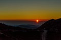 Beautiful Sunset over the Mountains of Crete Island, Greece. Panoramic View of the Horizon from the Mountain Top. The Night Falls Royalty Free Stock Photo