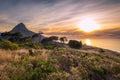 Beautiful sunset over the ocean and Lion`s head mountain view from Signal hill in Cape Town Royalty Free Stock Photo