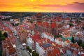 Beautiful sunset over the old town of Gdansk with City Hall and St. Mary Basilica, Poland Royalty Free Stock Photo