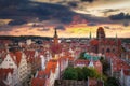 Beautiful sunset over the old town of Gdansk with City Hall and St. Mary Basilica, Poland Royalty Free Stock Photo