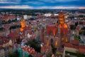 Beautiful sunset over the old town of Gdansk with City Hall and St. Mary Basilica, Poland Royalty Free Stock Photo