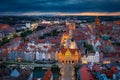 Beautiful sunset over the old town of Gdansk with City Hall and St. Mary Basilica, Poland Royalty Free Stock Photo