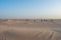 Beautiful sunset over Sahara desert in Douz, Tunisia. Sand and dunes against sky Royalty Free Stock Photo