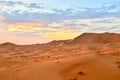 Beautiful sunset over Sahara desert sand dunes in Morocco, Africa Royalty Free Stock Photo