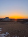 Beautiful sunset over sand dunes in the White Desert in Egypt Royalty Free Stock Photo