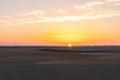 Beautiful sunset over sand dunes in the White Desert in Egypt Royalty Free Stock Photo