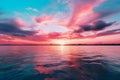 Beautiful sunset over the sea with clouds and sky reflection in water Royalty Free Stock Photo