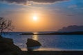 Beautiful sunset over the sea rocky coast Royalty Free Stock Photo