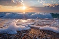 Beautiful sunset over the sea, waves and pebbles Royalty Free Stock Photo