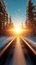 beautiful sunset over snowy train tracks in forest Royalty Free Stock Photo