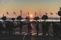 Beautiful sunset over the stunning Garda Lake in Italy, with the sun reflecting on the calm water