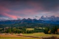 A beautiful sunset over the Tatra Mountains . The pass over Lapszanka in Poland