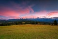 A beautiful sunset over the Tatra Mountains . The pass over Lapszanka in Poland