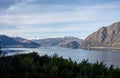 Beautiful sunset panorama at Hawea lake with snow capped mountains in the background on a winter day, New Zealand Royalty Free Stock Photo