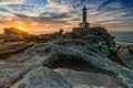 Beautiful sunset at the Punta Nariga lighthouse in Galicia Royalty Free Stock Photo