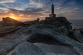 Beautiful sunset at the Punta Nariga lighthouse in Galicia Royalty Free Stock Photo