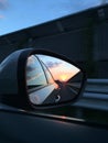 Beautiful sunset in a rearview mirror Royalty Free Stock Photo