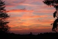 Beautiful sunset with red clouds on a calm evening. Royalty Free Stock Photo