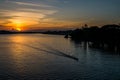 Beautiful sunset reflected with boat in river,Thailand