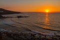 Beautiful sunset at a rocky beach in Pomos, Cyprus Royalty Free Stock Photo