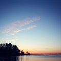 Beautiful sunset. Russian North. Lake and trees. Royalty Free Stock Photo