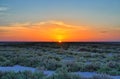 Beautiful sunset on salt lake Chott el Djerid, Sahara desert, Tu