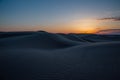 Beautiful sunset in sand dunes over barkhan desert in Kazakhstan