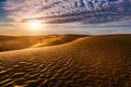 Beautiful sunset in sand dunes over desert Royalty Free Stock Photo