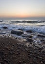 Beautiful sunset on the sandy beach of the Baltic Sea in Lietva, Klaipeda