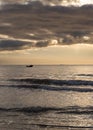 Beautiful sunset on the sandy beach of the Baltic Sea in Lietva, Klaipeda