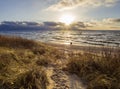 Beautiful sunset on the sandy beach of the Baltic Sea in Lithuania, Klaipeda