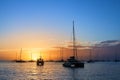 Beautiful sunset on the sea beach, boats, ships and yachts on water background