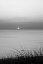 Beautiful sunset at the sea. Black and white photography Royalty Free Stock Photo