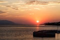 Beautiful sunset with sea and pier in Loutraki, Grecee Royalty Free Stock Photo