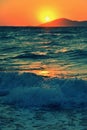 Scenic sunrise or sunset over sea surface. Concept for summer and sea vacation. Greece - island of Kos beach.