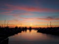 Beautiful sunset with sea and yachts view