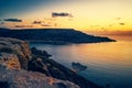 sunset and seascape view of Golden Bay, Malta, travel background Royalty Free Stock Photo