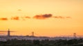 Beautiful sunset on 25 de Abril Bridge and Cristo Rei, Lisbon, Portugal Royalty Free Stock Photo